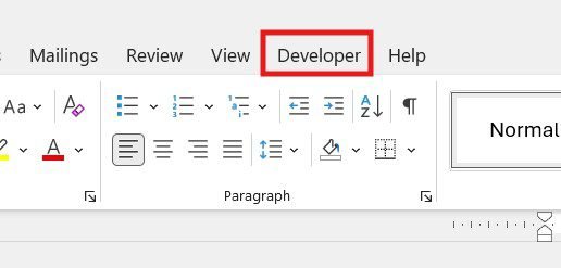 How to insert a check box in Word - Developer tab visible in the ribbon