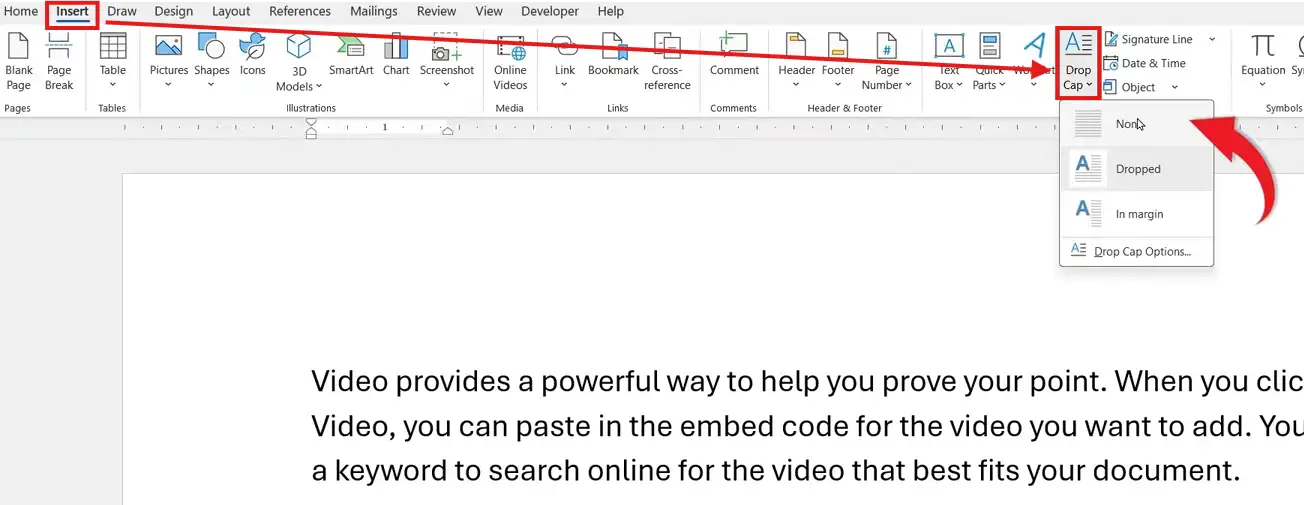 Microsoft Word Insert tab Drop Cap menu showing None Dropped and In Margin options to add a drop cap in Word or remove it