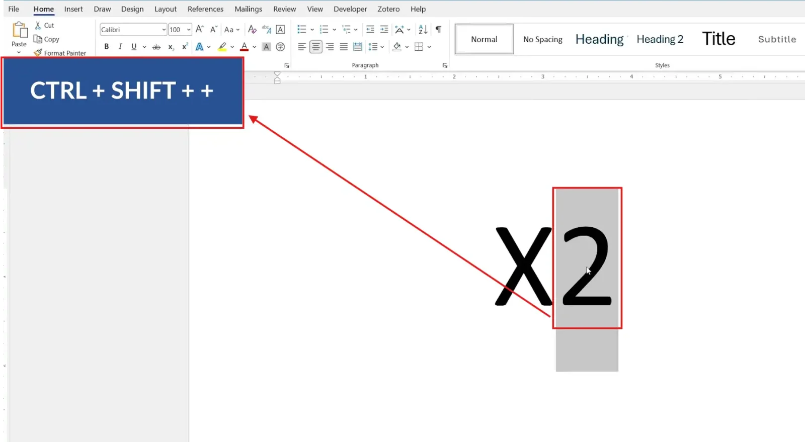 Keyboard showing Ctrl Shift Plus shortcut for applying superscript in Word to format the expression X²